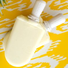 a soap bar sitting on top of a yellow and white table