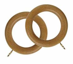 two wooden rings are shown on a white background