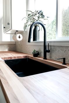 the kitchen sink is clean and ready to be used as a counter top for cooking