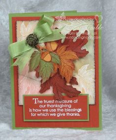 a handmade card with leaves on it