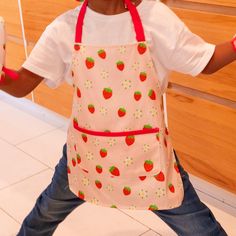 Our officially licensed Strawberry Shortcake Child Cooking Classic Apron Dress Up.  Ignite the culinary passion in your little one with our Strawberry Shortcake Cooking Classic Apron Dress Up - where imagination meets delicious fun! Whether they're dreaming up fantastical recipes or hosting a make-believe cooking show, this outfit is the recipe for endless enjoyment.  Crafted with premium 100% organic cotton, this apron ensures comfort and durability even during the most enthusiastic cooking ses Strawberry Snap, Berry Picking Apron, Kawaii Apron Cooking, Childs Apron, Cobbler Aprons, Free Dresses, Cute Strawberry, Apron Dress