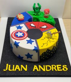 a birthday cake made to look like the avengerss