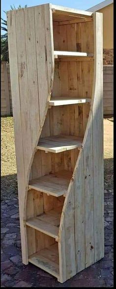 a wooden shelf with shelves built into it