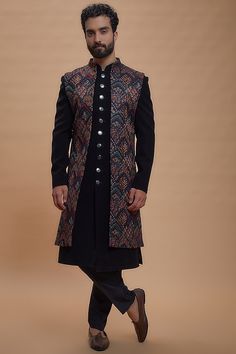 Buy RIYAASAT Black Imported Suiting Embroidered Indo-Western Set at Pernia'sPopUpShopMen 2023 Indo Western Wedding Outfits For Men, Indo Western Suits For Men, Black Indowestern Men, Indo Western For Men Indian Weddings, Men Indowestern Wear, Groom Sangeet Outfit For Men, Mens Indowestern Outfits Wedding, Latest Indowestern Outfits For Men, Indo Western Men