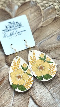 This listing is for one pair of handpainted wood earrings with nickel free gold color hardware. All designs are completely created by Michele Norman. Main color: Cream  Earring length (not including hardware): 2" Cream Earrings, Wood Earrings, Woodstock, Main Colors, All Design, Gold Color, Etsy Earrings, Dangle Drop Earrings, Hand Painted