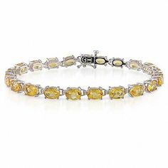 This new take on the traditional tennis bracelet is a great look for the modern sophisticate. Fashioned in sleek sterling silver, this tennis-style bracelet features 7.0 x 5.0mm oval golden yellow citrines linked in perfect alignment, creating an eye-catching look that elevates any attire. Buffed to a brilliant shine, this 7.5-inch bracelet secures with a box clasp. Cheap Silver Rings, Silver Jewellery Online, Handcrafted Silver Jewelry, Citrine Bracelet, Silver Ring Designs, Bracelet In Silver, Peoples Jewellers, Box Clasp, Jewelry Style