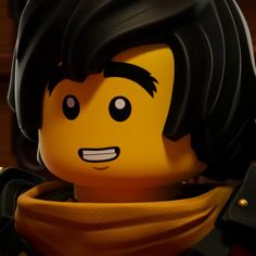 the lego movie character is wearing an orange scarf and black hair, with his eyes wide open