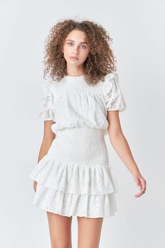 Be the belle of the ball in this Smocked Lace Mini Dress! Its all-over lace, drop waist with smocking detail, and short sleeves with lining make this dress a fashionable yet comfy choice to wear for any special occasion. Perfect for a romantic dinner, dance, or any other exciting event, this mini dress is an absolute must-have. Don't miss the chance to show off your curves in this beautiful dress - buy now! All over lace Smocked drop waist Short sleeve Lining Mini length Hand wash cold Do not bl Lace Mini Dress With Smocked Bodice, Knee-length Cotton Mini Dress With Smocked Bodice, Mauve Ruffled Mini Dress, Feminine V-neck Mini Dress With Smocked Bodice, Casual Mini Dress With Smocked Bodice And V-neck, Mauve Dress, Tweed Dress, Heat Styling Products, Romper With Skirt