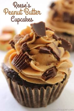 some cupcakes with peanut butter and chocolate frosting