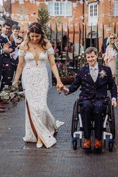 Confetti moment with bride in a lace off the shoulder wedding dress holding hands with her groom in a navy blue suit Wedding Ceremony Confetti, Cat Stephens, Confetti Wedding Exit, Off The Shoulder Wedding Dress, Pub Wedding, Shoulder Wedding Dress, Boat Wedding, Brewery Wedding