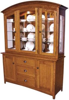 a wooden china cabinet with glass doors and drawers