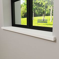 an open window with a bench in the background