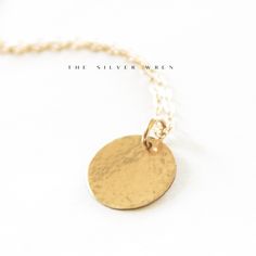 Simple Disc Necklace This simple disc necklace is a classic design that is hammered by hand for an elegant finish. Perfect for layering or everyday wear! •Your choice of disc in 13mm, 16mm or 19mm •A high quality delicate link chain •Hammered by hand for an elegant finish•14kt Gold-Filled or Sterling Silver - not plated Water friendly Model is wearing the 16mm disc at 20" compliments of Lily and Grant Blog Disc Necklace, Dainty Necklace, 14kt Gold, Link Chain, Silver Necklaces, Classic Design, Gold Filled, Layering, Everyday Wear