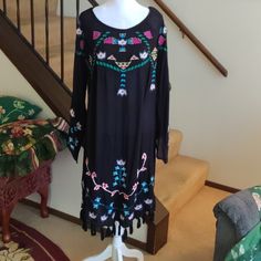 Sundance Dress. Lightweight Black Gauze Dress. Beautiful Multicolor Aztec Embroidery. Bell Sleeves. Tassel Hemline.Beautiful Summer Dress. 38" Long. Never Worn. Fitted Multicolor Dress With Tassels, Fitted Multicolor Dresses With Tassels, Black Fitted Embroidered Dress For Festival, Black Fitted Bohemian Embroidered Dress, Fitted Black Bohemian Embroidered Dress, Black Long Sleeve Dress For Festival, Bohemian Black Embroidered Party Dress, Bohemian Black Dress With Floral Embroidery, Black Long Sleeve Embroidered Beach Dress