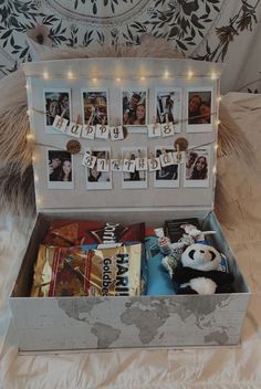 an open suitcase with pictures and lights on it