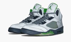 This unique colorway of the Air Jordan 5 from 2006 features a reflective silver upper accented with ‘Green Bean’ throughout. Sporty Silver Basketball Shoes For Streetwear, Casual Silver Basketball Shoes For Streetwear, Silver Custom Casual Sneakers For Sports, Silver Casual Custom Sneakers For Sports, Silver Casual Sneakers For Sports, White Casual Sneakers With Reflective Logo, Green Bean Jordan 5s, Jordan 5 Green Bean, Jordan 5s