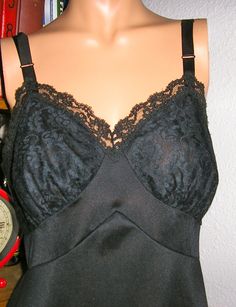 "Vintage 50s, black full nylon slip, by Lorraine. Lace trim. Size 36. Excellent condition, no flaws or damage. Measurements: Chest across front: 18\" Waist across front: 15\" Hips across front: 20\" Length: 33\" from armpit Please read all measurements and view all photos provided before purchasing as I do NOT accept returns. I do my best to list accurate measurements and notate all visible flaws/signs of wear. I am happy to send additional pictures of any listing. I usually ship the next busine Camilla Mendes, Lorraine, Festival Bra, Lace Trim, The Next, Slip On, Trim, Bra, Signs