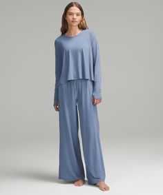 Luxury lounging at its finest. This flowy long sleeve is cut from a silky-soft modal fabric that gives lots of movement and stretch. A trapeze shape keeps things breezy. Designed for Casual. A loose fit with a little extra room:High-hip length. Effortless Long Sleeve Fitted Tops, Long Sleeve Tops For Summer Lounging, Versatile Long Sleeve Top For Lounging In Spring, Versatile Long Sleeve Top For Spring Loungewear, Versatile Lululemon Tops, Lululemon Long Sleeve Tops For Loungewear, Versatile Solid Color Lululemon Tops, Versatile Lululemon Tops For Fall, Casual Lululemon Tops For Spring