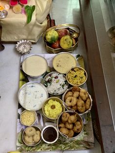 an assortment of food is displayed on a table