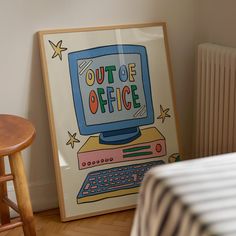 there is a poster with the words out of office on it next to a bed