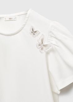 Embroidered butterflies t-shirt - Girls | Mango Kids USA White Cotton Tops With Butterfly Embroidery, White Butterfly T-shirt For Spring, White Butterfly-shaped Top For Summer, Cotton Tops With Butterfly Print And Short Sleeves, Summer Cotton Tops With Butterfly Embroidery, Short Sleeve Cotton Tops With Butterfly Print, Short Sleeve Cotton Tops With Butterfly Embroidery, Casual White Top With Butterfly Embroidery, Summer Crew Neck Tops With Butterfly Embroidery