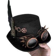 Enhance your look with this versatile unisex top hat. It's an impressive choice that can truly transform your appearance. Designed to impress both men and women, it comes with goggles. Crafted from high-quality synthetic leather, you'll love its style and comfort. Buy now! Black Punk Hat For Cosplay, Black Steampunk Hat For Alternative Fashion, Punk Black Mini Hat For Cosplay, Adjustable Gothic Costume Hats For Winter, Steampunk Brimmed Mini Hats For Cosplay, Adjustable Gothic Costume Hats And Headpieces For Winter, Steampunk Brimmed Halloween Costume Hat, Punk Style Black Mini Hat For Cosplay, Adjustable Gothic Winter Costume Hats And Headpieces