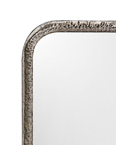 a mirror that is sitting on top of a table