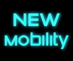 the words new mobility are glowing in the dark