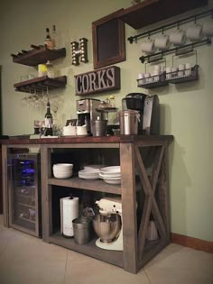 a kitchen area with shelves, appliances and other items on the wall above it that says corks