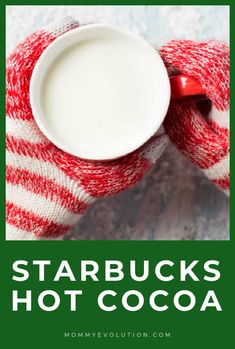 two red and white striped socks with a cup of coffee in the middle that says starbucks's hot cocoa