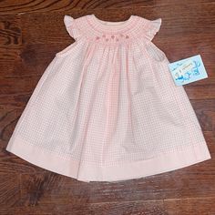 Brand New With Tags! Pink And White Gingham Smocked Style Sleeveless Button Detail On Back Ruffle Detail On Sleeves Embroidery Handmade 9 Months 100% Cotton Sleeves Embroidery, Smocked Dress, Button Detail, Kids' Dresses, Pink And White, Smocking, Gingham, Pink White, Baby Clothes