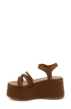 Espadrille-inspired braiding highlights the lofty platform sole of this bold, retro sandal. 3 1/4" heel; 2 3/4" platform Textile and leather upper/synthetic lining/rubber sole Imported Leather Wedge Sandals With Braided Straps For Vacation, Leather Wedge Sandals With Braided Straps For Beach, Synthetic Sandals With Braided Ankle Straps, Leather Chunky Platform Sandals For Beach, Brown Synthetic Platform Sandals, Casual Leather Wedge Sandals With Braided Straps, Synthetic Open Toe Wedge Sandals With Braided Straps, Synthetic Sandals With Woven Leather And Round Toe, Synthetic Braided Strap Open Toe Wedge Sandals