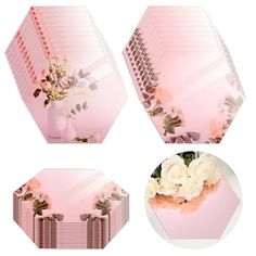 four pink boxes with flowers in them