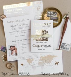 the wedding stationery is laid out on top of an envelope and some other items