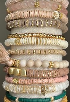 a stack of bracelets that are stacked on top of each other