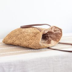 In Stock Fast Shipping from Los Angeles Add a touch of whimsy to your summer wardrobe with Elena Handbags' Straw Woven Fashion Bag. Made from lightweight straw, this bag features a playful floral design and a convenient zipper closure. Stay stylish and carefree all season long! Inside pocketDimensions: 16"H x 16.5"W x 1"DZipper closureStrap drop length: 10 inches Designer Style ID: 8478 Large Straw Woven Tote Bag, Summer Bag, Everyday Shoulder Bag, Beach Bag Handwoven Beige Straw Beach Bag, Artisan Beige Woven Straw Bag, Sand-colored Woven Straw Bag For Everyday, Sand-colored Woven Straw Bag, Summer Beach Bag, Woven, Everyday Shoulder Bag, Tote Bag Summer, Woven Tote Bag, Bag Summer