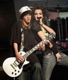 an image of two people that are playing guitar and one has the words bill mmm new cologne? tom not that's my sweat