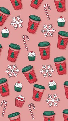 christmas cupcakes and candy canes on pink background