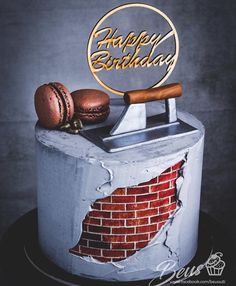 a birthday cake decorated with an image of a brick wall and baseball bat on top