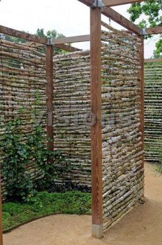 a wooden structure made out of sticks and logs