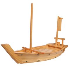 a small wooden boat with a flag on it