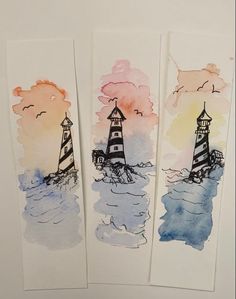 three watercolor cards with lighthouses on them