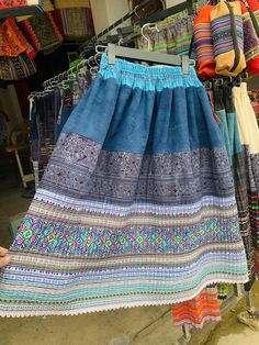 Hmong skirt vintage A unique women's skirt has been created using vintage Hmong women's skirts from northern Vietnam. The original skirt was traditionally designed, featuring intricate hand embroidery and batik pattern.  To improve convenience and comfort, the skirt has been made with a complete and elastic waistband. This allows customers to wear the skirt easily and experience optimal comfort. Length ~ 75-80 cm (30'' - 32'') Waist ~ 63cm - 100cm (25'' - 40'') Please note that due to the handma Hmong Skirt, Northern Vietnam, Brocade Skirt, Motif Batik, Batik Pattern, Vintage Rock, Women's Skirts, Women's Costumes, Vintage Skirt