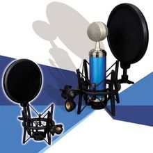 two microphones are next to each other on a blue and white background