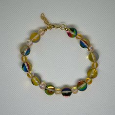 Handmade 7 In Gold Wire Bracelet With A 1 In Extender Featuring Larger And Smaller Yellow Glass Flash Beads! Handmade Gold, Wire Bracelet, Gold Wire, Women Accessories Jewelry, Womens Jewelry Bracelets, Women's Accessories, Jewelry Accessories, Handmade Jewelry, Charm Bracelet