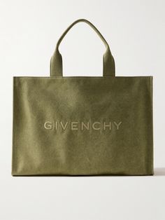 Givenchy's tote bag is embroidered with both the moniker and 4G logo, so you can rep the brand on either side. It's made from durable canvas and has plenty of room inside for all of your essentials, plus a laptop, planner and water bottle. Designer Canvas Bags With Embroidered Logo, Everyday Bags With Embroidered Logo And Double Handle, Shopping Bags With Double Handle And Embroidered Logo, Designer Rectangular Bag With Embroidered Logo, Rectangular Shoulder Bag With Embroidered Logo For Shopping, Designer Shoulder Bag With Embroidered Logo For Everyday, Tote Bag With Embroidered Logo For Shopping, Canvas Tote Bag With Embroidered Logo, Designer Canvas Shoulder Bag With Embroidered Logo