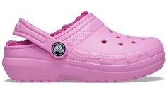 Warm And Fuzzy Feelings InsideKids love the comfort of the Crocs Classic Clog — and now there’s a toasty lined version to keep the feeling going all season. The soft, fuzzy liner adds to the cushion and comfort. They’re great as slippers, yet capable outdoors, too. Croslite™ foam construction keeps them light and easy to wear. The pivoting heel strap gives kids a secure fit, or push it forward for an easy-on option.  Toddler Classic Lined Clog Details:    The legendary Kids' Classic Clog, now wi Pink Round Toe Clogs For Winter, Pink Winter Clogs, Push It, Crocs Classic Clogs, Pretty Princess, Strap Heels, And Now, Clogs, Slippers