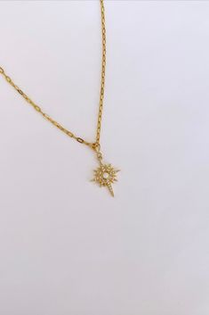 ♥Stunning Opal Star Necklace with crystal details and a gold chain ♥Beautiful on its own or layered ♥MATERIAL -16K gold plated over brass Plated jewelry is a wonderful, affordable way to add a sophisticated look to your wardrobe, with the look of real gold. It is also an excellent choice for people with sensitive skin. Celestial Starburst Necklace With Star Charm, Gold Starburst Necklace With Star Charm, Opal Necklace Gold, North Star Necklace, Jewelry Star, Starburst Necklace, Necklace Star, Necklace Opal, Opal Necklace