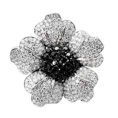 A beautiful floral design brooch set with round black diamonds surrounded by round, brilliant-cut white diamonds. A double clip pin back. Stamped 750 Moissanite Diamond Rings, Dream Gift, Black Diamond Ring, Diamond Brooch, Diamond Cocktail Rings, Silver Wedding Rings, 925 Silver Jewelry, Cz Diamond, Moissanite Diamonds