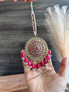 Big Jumbo Bahubali pearl jhumki earrings with maangtikka. Pink Kundan Necklace With Latkans As A Gift, Pink Kundan Necklace With Latkans For Gifts, Traditional Pink Kundan Necklace With Latkans, Bollywood Style Pink Kundan Tikka, Bollywood Style Pink Tikka With Stone Work, Pink Bollywood Tikka For Festivals, Pink Kundan Tikka For Diwali, Festive Pink Kundan Tikka, Pink Chandbali Kundan Necklace For Festivals